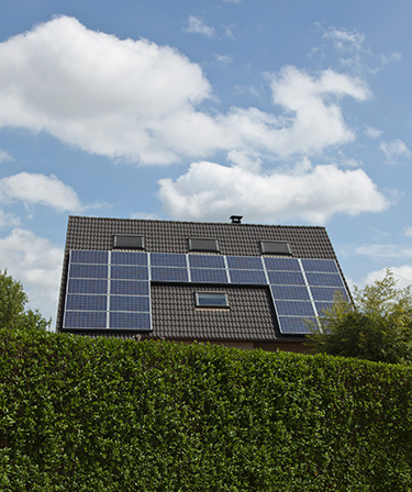 Image of a house roof with solar panels